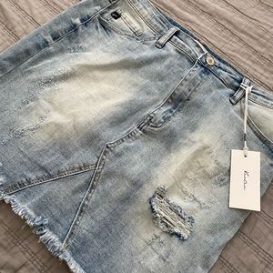 Distressed Jean mini skirt
